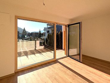 Soggiorno-cucina con accesso al giardino Soggiorno-cucina con accesso al giardino