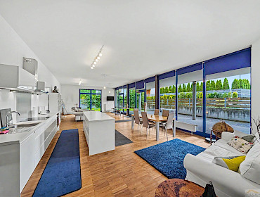 Modernly furnished living room with dining area Modernly furnished living room with dining area