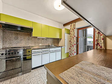 Cucina con accesso al balcone Cucina con accesso al balcone